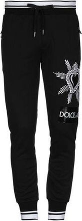 Dolce & Gabbana PARTES DE ABAJO - Pantalones en YOOX.COM
