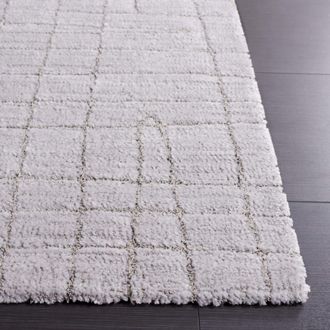 Safavieh Alfombra s&oacute;lido y tonal de poli&eacute;ster gris, 235 x 305 cm
