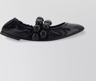 Alaia patent leather ballet flats