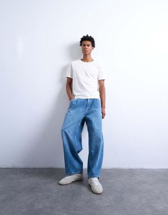 Topman Jeans bombati lavaggio blu medio a pieghe