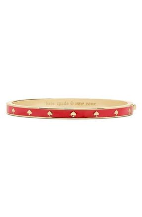 Kate Spade New York spot the spade enamel bangle bracelet in Hot Cinnamon at Nordstrom