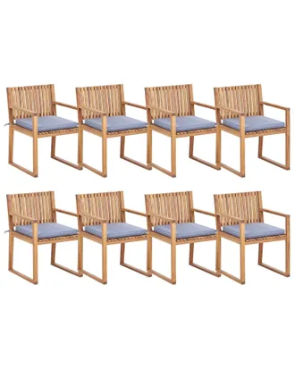 Beliani Set Di 8 Sedie Da Giardino In Legno Di Acacia Chiaro Certificato Con Cuscini Blu Sassari Ii