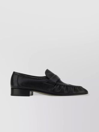 The Row black nappa leather loafers