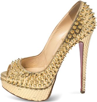 Christian Louboutin Pumps met python-reli&euml;f en studs - Goud