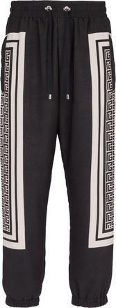 Balmain monogram-scarf drawstring track pants - men - Polyester/Elastane - 48 - Black