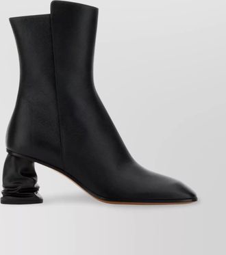 Alexander McQueen leather ankle boots with unique heel design