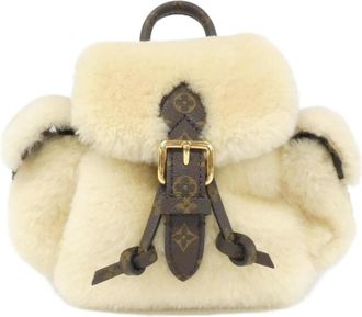 Louis Vuitton Cream Coated Canvas Backpack (Pre-Owned)