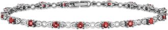 The Diamond Store Ruby and Lab Diamond Tennis Bracelet Claw Set in 925 Silver