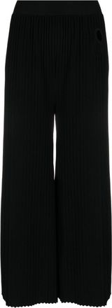 Stella McCartney pliss&eacute; palazzo pants - women - Polyester/Viscose - 42 - Black