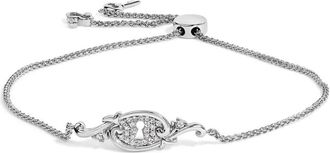 House of Brilliance Sterling Silver 1/10 Cttw Diamond Keyhole Charm Bolo Bracelet