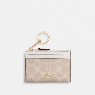Coach Mini Skinny Id Case In Signature Canvas
