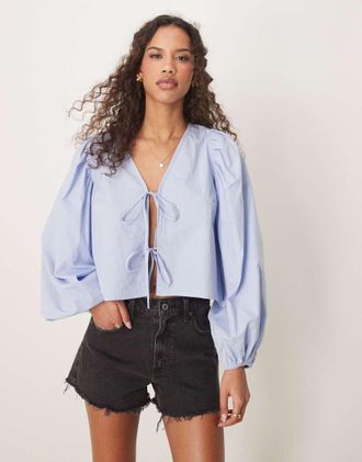 Gina Tricot blouse top with tie front and volume sleeves in blue