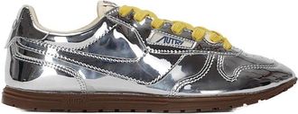 Autry Front Lace Sneakers In Bright Yellow And Shiny Silver