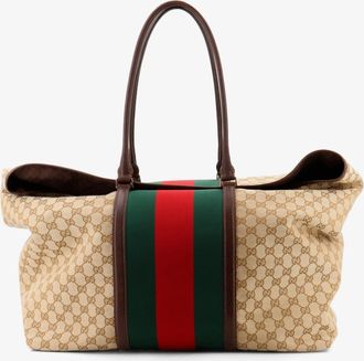 Gucci Borsa da viaggio in tessuto GG con dettaglio Nastro Web frontale - GUCCI - gender_Man