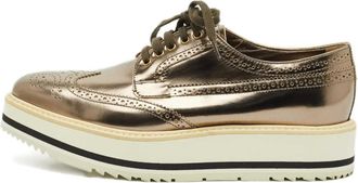 Prada Derby con plateau - Oro