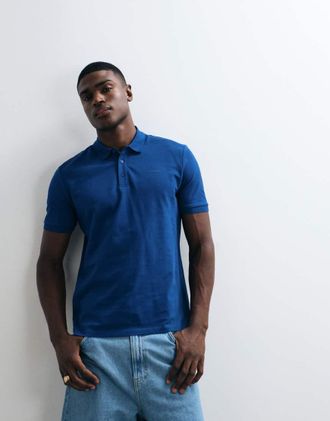 HUGO BOSS HUGO Red - Donos - Polo blu con stampa del logo sul petto