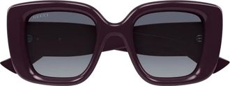 Gucci Zonnebril met vlinder montuur en logo - Paars