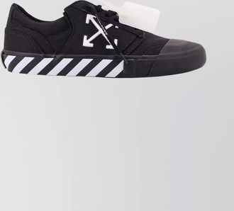 Off-white canvas low-top sneakers