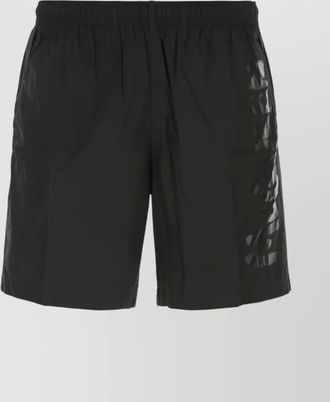 Alexander McQueen logo-print swim shorts