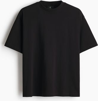 H&M Baumwoll-T-Shirt in Oversized Fit - Schwarz