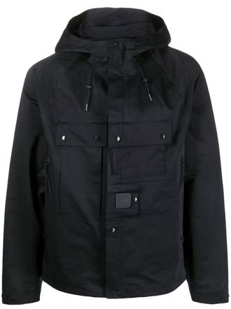 C.P. Company logo-patch zip-up hooded jacket - men - Polyester/Polyamide - 46 - Blue