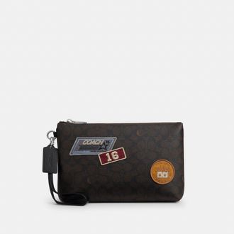 Coach Pouch In Signature Canvas With Patches