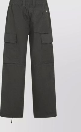 C.P. Company utility trousers featuring cargo pockets