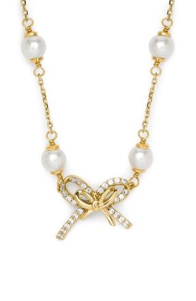 Kate Spade New York pav&eacute; bow faux pearl necklace in Cream/Gold at Nordstrom