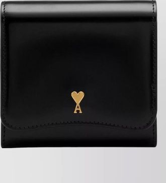 Ami compact wallet featuring gold tone hardware