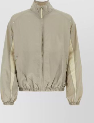 Reebok versatile stand-up collar windbreaker with zip pockets