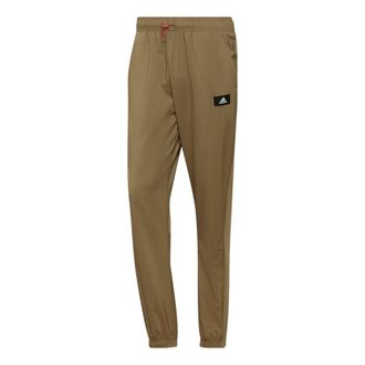 adidas Mens adidas Solid Color Logo Label Side Pocket Bundle Feet Sports Pants/Trousers/Joggers Green H61146