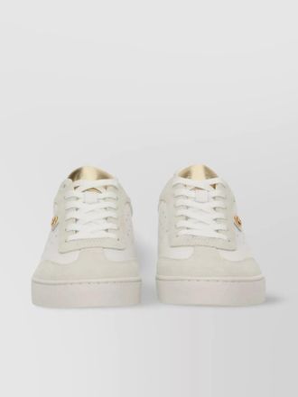 Michael Kors scotty sneakers with flat sole and gold accents