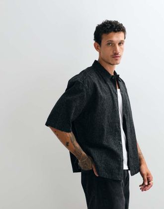 AllSaints Leopardo - Camicia a maniche corte nera con stampa leopardata-Nero