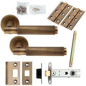 Loops Door Handle & Latch Pack Antique Brass Knurled Round Bar Screwless Round Rose in Metallics