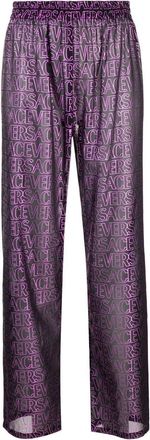 Versace logo-print semi-sheer pants - women - Polyester - 42 - Black
