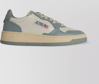 Autry leather sneakers with rubber sole and perforated toe