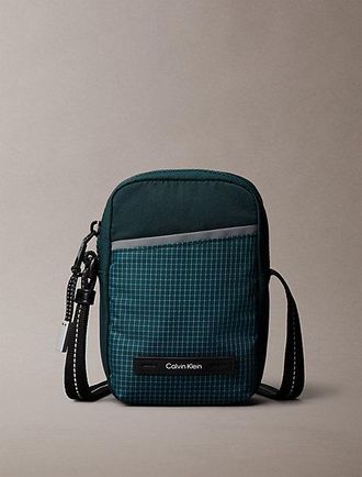 Calvin Klein Gestreepte slim utility reportertas met rits