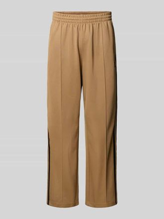 adidas Originals Trainingshose mit L&auml;ngsn&auml;hten und elastischem Bund in Mittelbraun, Gr&ouml;&szlig;e XL