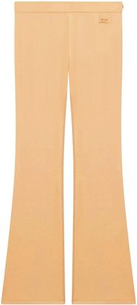 Courrèges embroidered logo flared-leg trousers - women - Polyester/Viscose - L - Neutrals