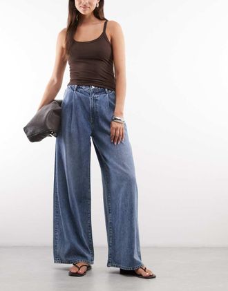 AllSaints Haze - Jeans a fondo ampio a pieghe lavaggio blu medio