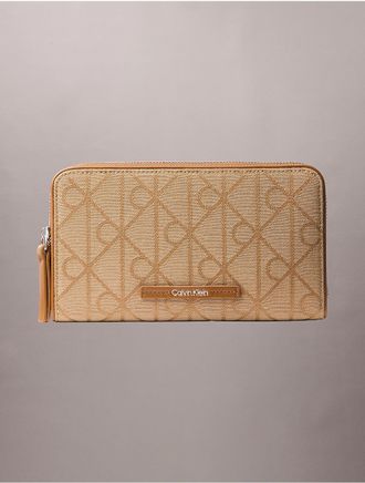 Calvin Klein Womens Allover Emblem Logo Passport Wallet - Brown