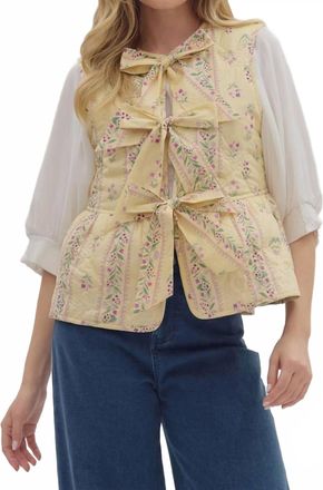 Entro Quilted Peplum Vest With Front Ties In Ecru
