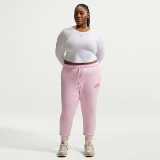 Nike Womens Nike Sportswear Club Fleece Graphic Mid-Rise Pants (Plus Size) in Pink | IO6242-663