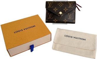 Louis Vuitton Brown Monogram Canvas Wallet (Bi-Fold) (Pre-Owned)