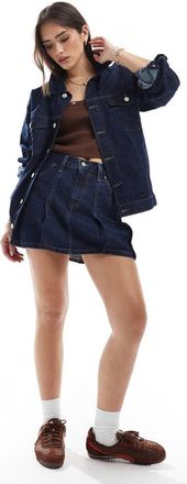 Levi's Minigonna in denim a pieghe blu lavaggio scuro-Blu navy