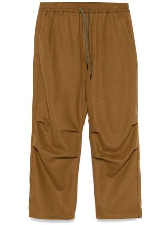 White Mountaineering knee-tuck trousers - Brown