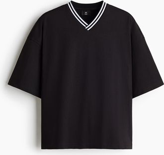 H&M Baumwoll-T-Shirt in Oversized Fit - Schwarz