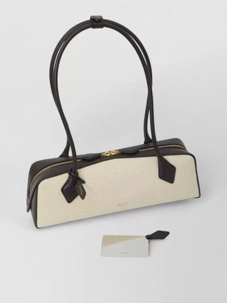Alaia canvas shoulder bag