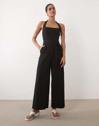 Mango tuta jumpsuit allacciata al collo nera-Nero