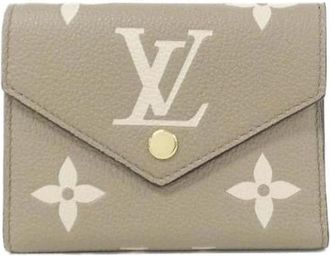 Louis Vuitton Pre-owned Monogram Empreinte Portemonnee - Dames - Vintage Accessoires - Beige - ONE Size - Leer - Vintage